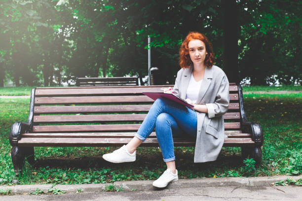 istock A girl with red hair 1014098690