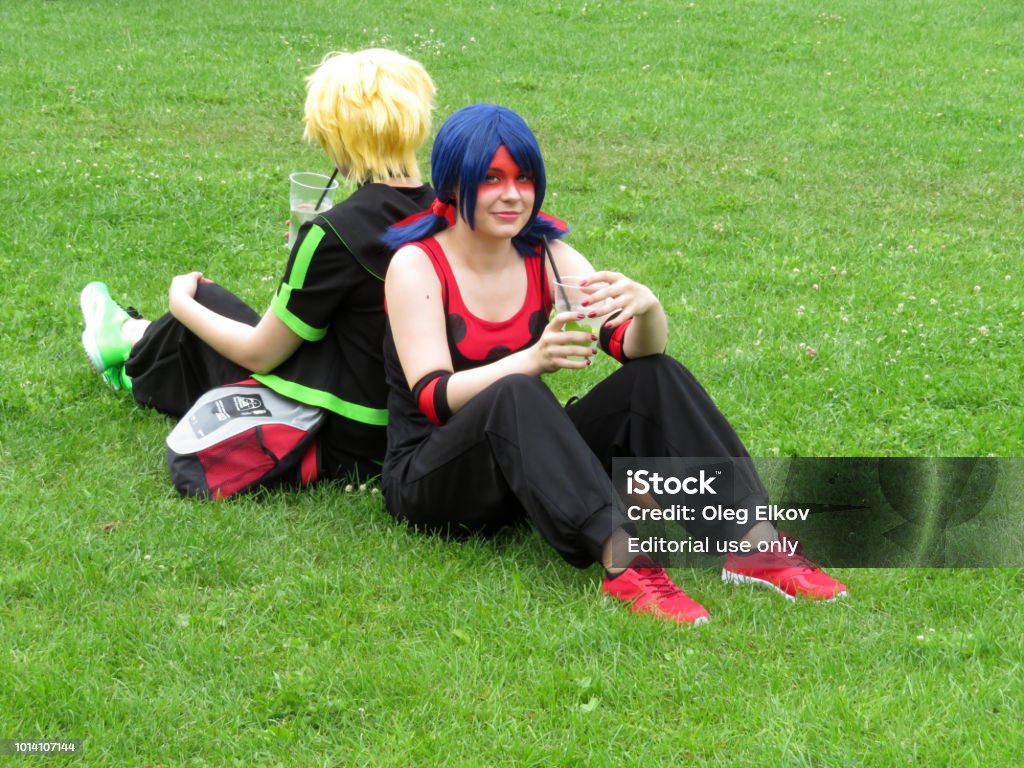 Manga Girls Dressed As Anime Characters Relaxing On Summer Meadow Stock  Photo - Download Image Now - iStock
