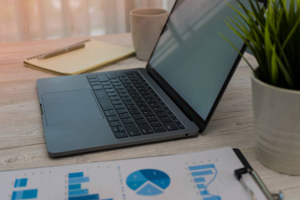 istock business documents on office desk with smart phone and computer laptop 1014126312