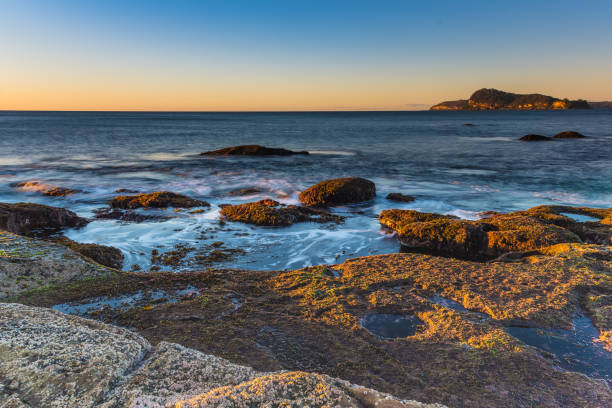 istock Low Tide Rocky Sunrise Seascape 1014127172