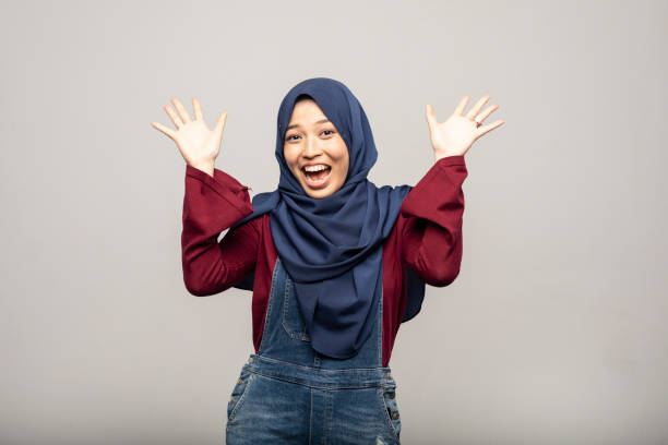 istock Surprised woman in traditional clothes, hands up 1014127606