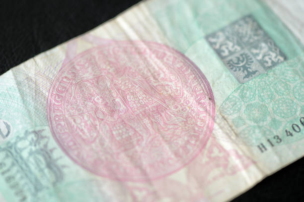 istock A banknote in one hundred Czech crown on a dark background close up 1014138230
