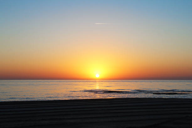 istock Sunrise or sunset on the beach. 1014139242