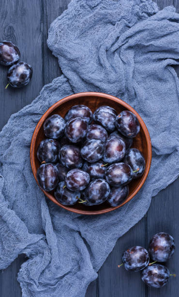 istock Garden plums in bowl 1014139572