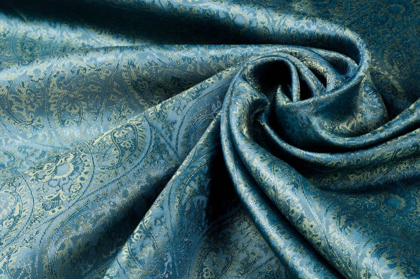 istock Background texture, pattern. Blue paisley silk chiffon mod fabric by the yard. Crinkled, flowy, soft, very light, 1014144198