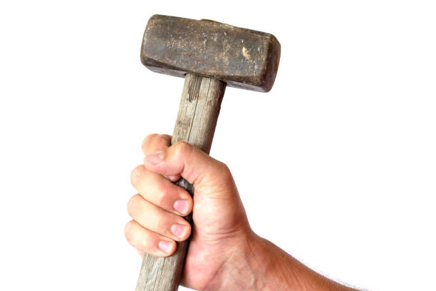 istock Sledgehammer in male hands on a white background. 1014145158