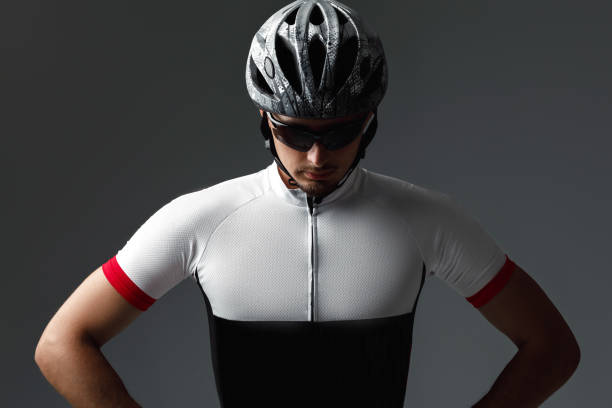 portrait of cyclist wearing helmet - human powered vehicle flash imagens e fotografias de stock