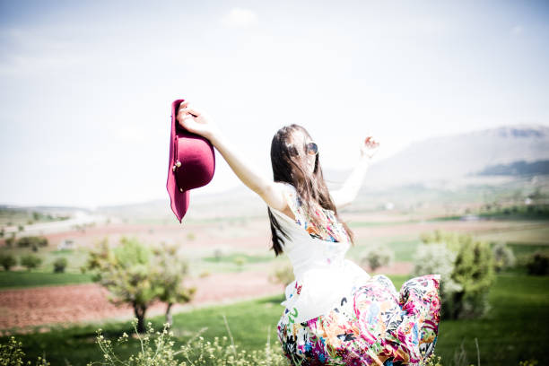 istock a young woman in the spring 1014151346