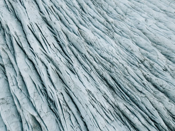 istock Drone view at Glacier Svinafellsjokull rocky texture 1014151932