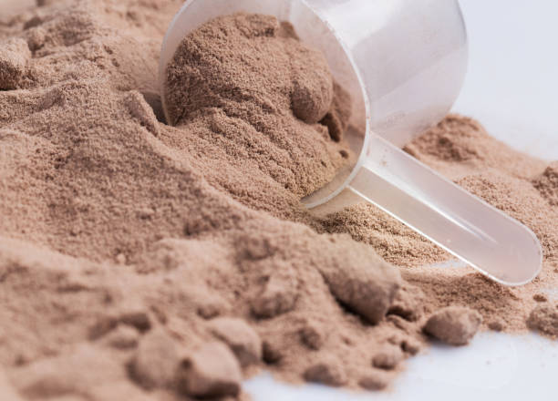 istock Protein powder and scoop 1014154032