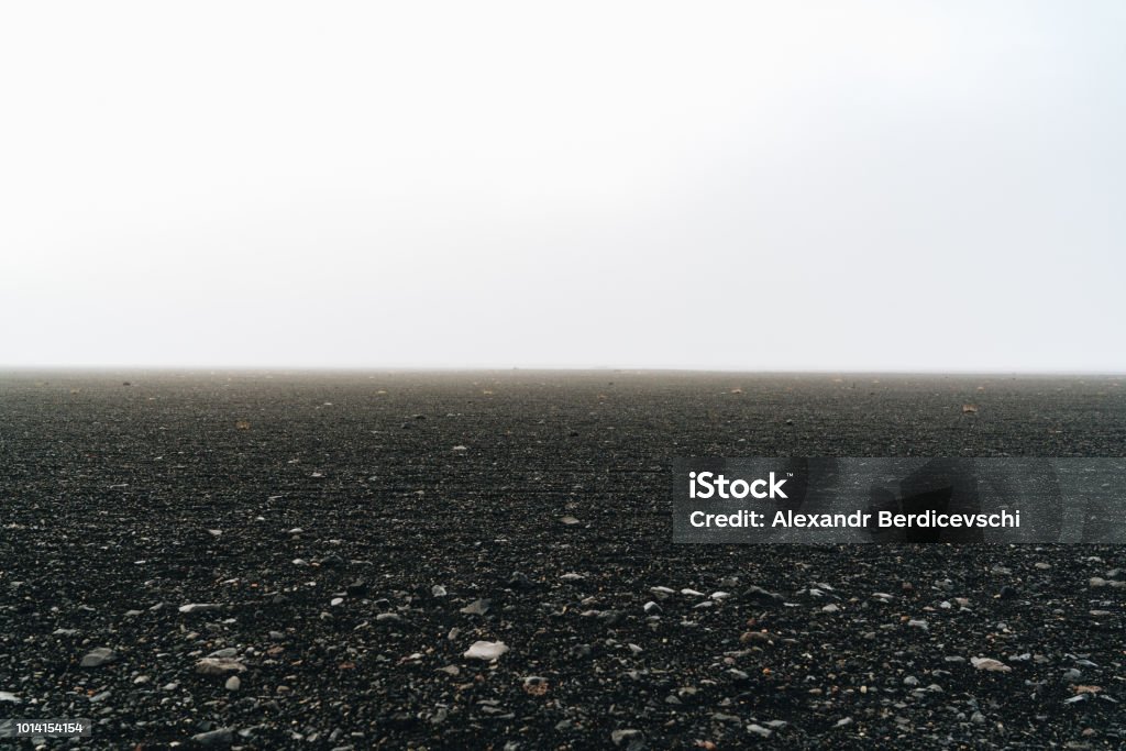 Black sand white sky iceland volcanic desert Agricultural Field Stock Photo
