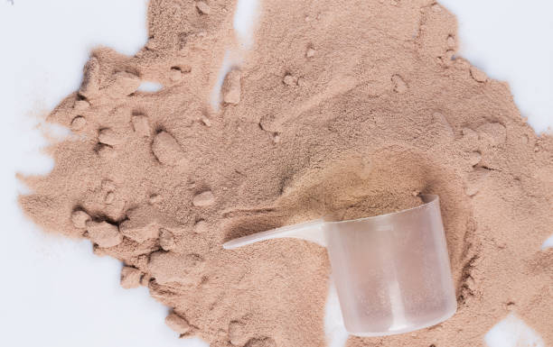 istock Protein powder and scoop 1014154194