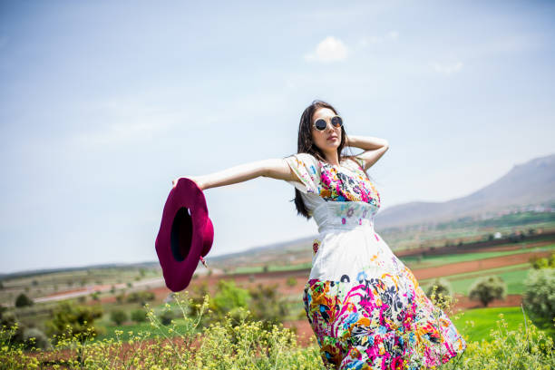 istock a young woman in the spring 1014155284