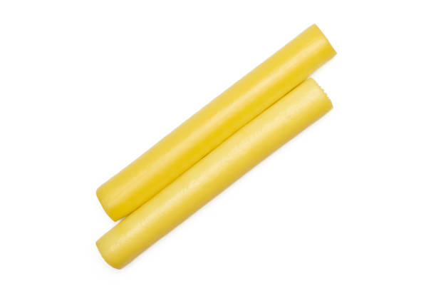 istock Smoked slovak string cheese stick isolated on white 1014155348
