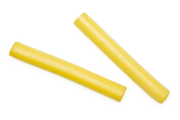 istock Smoked slovak string cheese stick isolated on white 1014155356