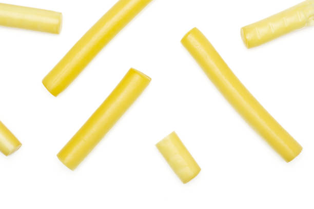 istock Smoked slovak string cheese stick isolated on white 1014155386