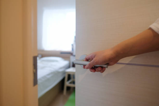 Closeup of hand on the doorknob