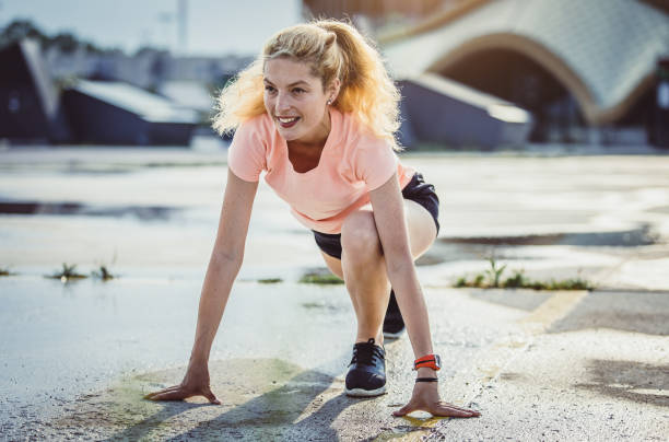 istock Female Athlete Stretching in Urban Environment 1014163622