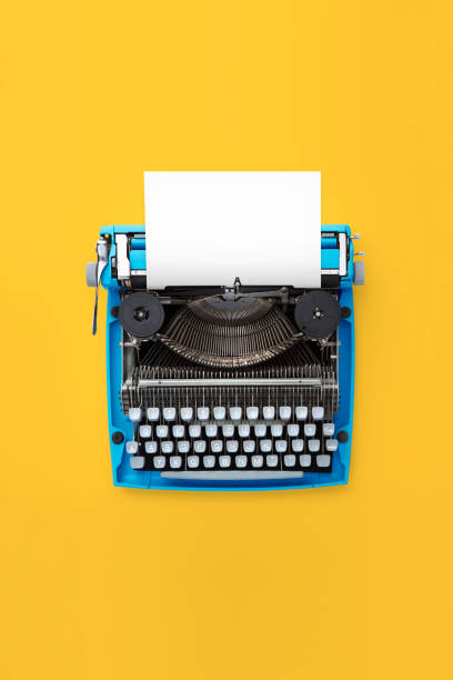 istock Typewriter machine in retro style on yellow background. 1014164966