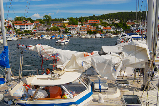 Drobak, Norway - July 08, 2006: View to harbor and  boats in Drobak, Norway.