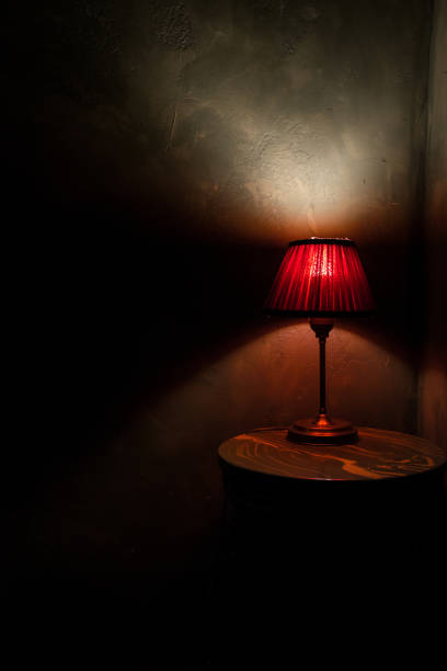 istock Vintage lamp on a wooden table 1014174846