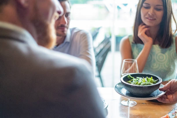 istock Serving soybean in sushi bar 1014177418