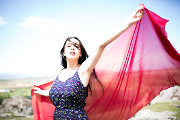 istock a young woman in the spring 1014177706