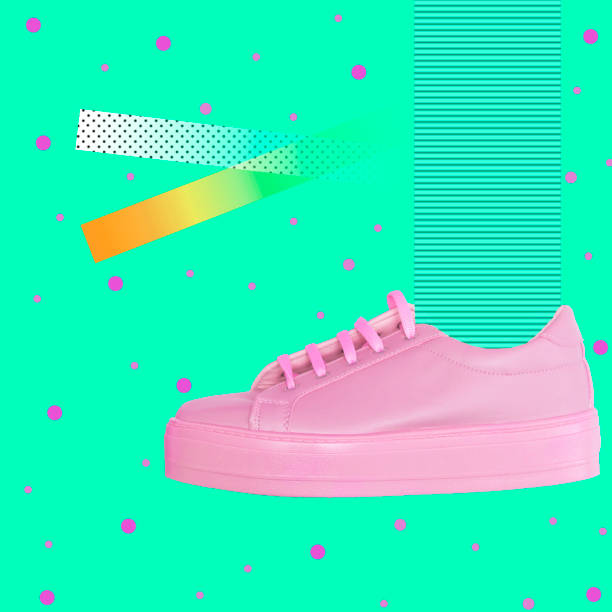 istock pink sneaker on geometric background with lines and dots. 1014178142
