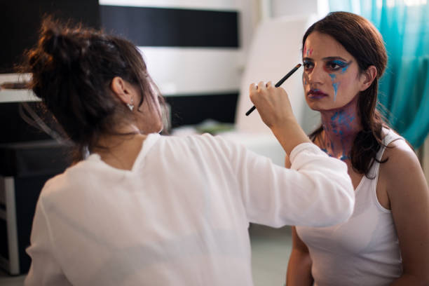 istock Artist painting on a human model 1014178714