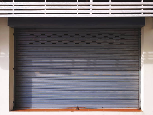 istock Full Frame Corrugated Metal Door at Store Front 1014181886