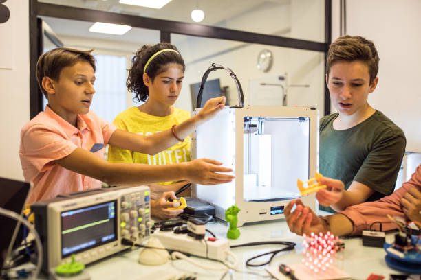 istock Teenage students lerning about 3D printer 1014211694