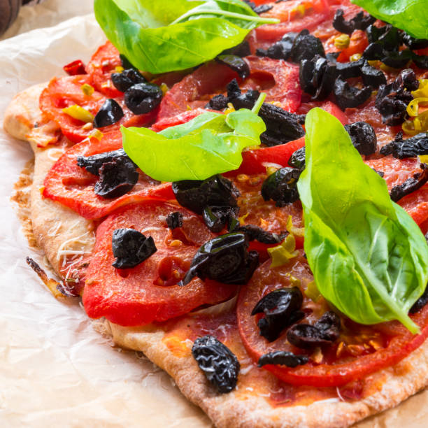 homemade olive - tomato pizza
