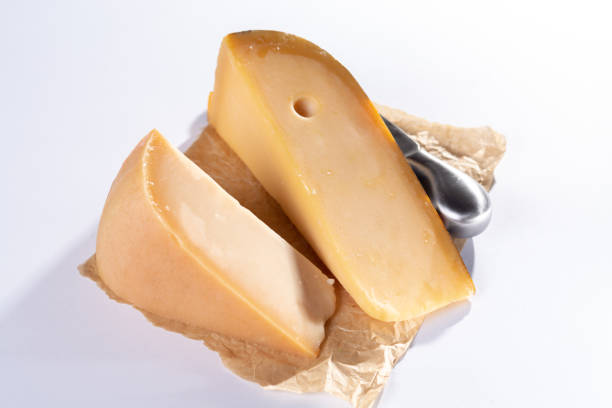 istock Dutch old cheeses, made from cow and goat milk on white table 1014216876
