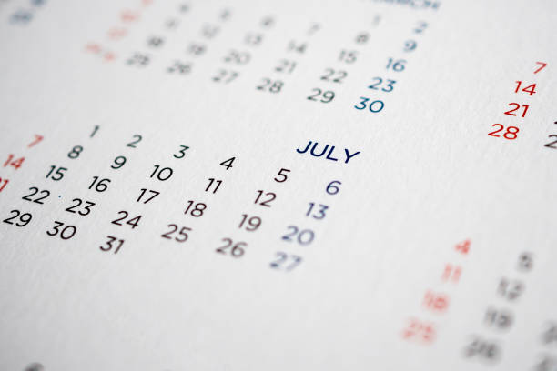 istock July calendar page with months and dates 1014224324