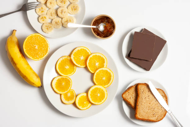 istock Chocolate bar banana bread and sliced orange 1014227640