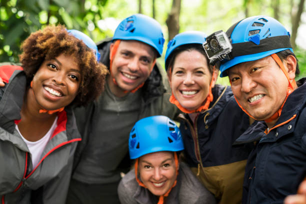 istock Group of diverse friends trekking together 1014231386