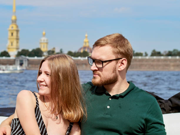 istock A young couple is traveling on a speedboat. 1014231402