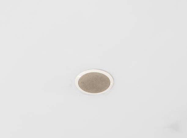 istock Modern loudspeaker is built-in the white ceiling. 1014233194