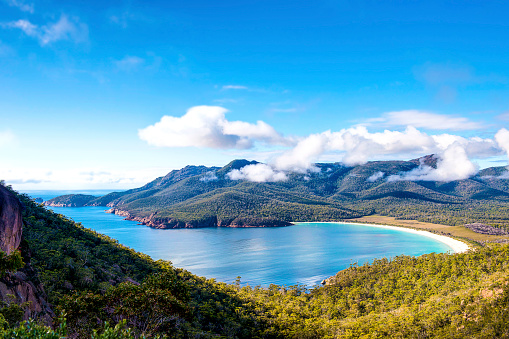 Elevated view of a picturesque sand bay surrounded by hills.