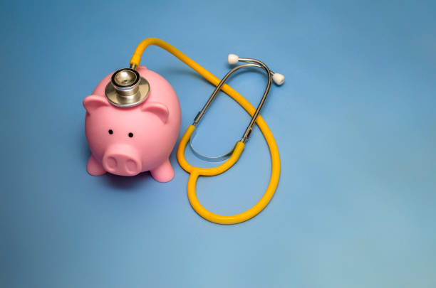 istock Piggy bank with stethoscope 1014238394
