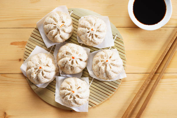 istock Chinese steamed bun on wooden basketwork 1014251698