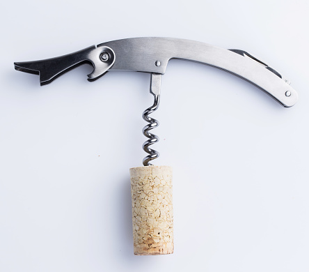 Close up of corkscrew with cork