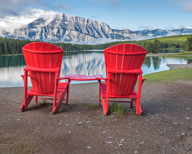 istock Red Chairs at Two Jack Lake 1014253572