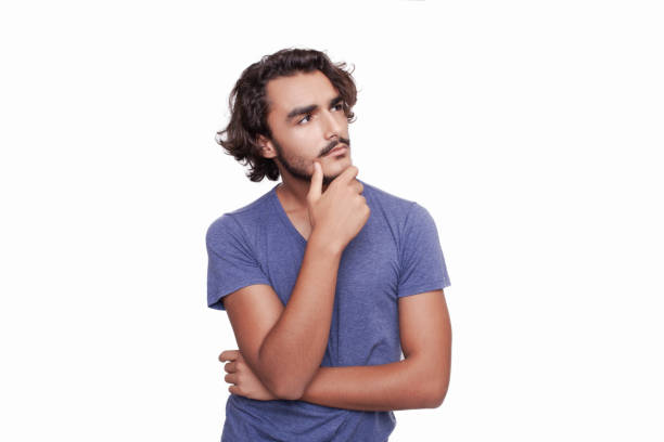 istock Portrait of thinking young man 1014256104