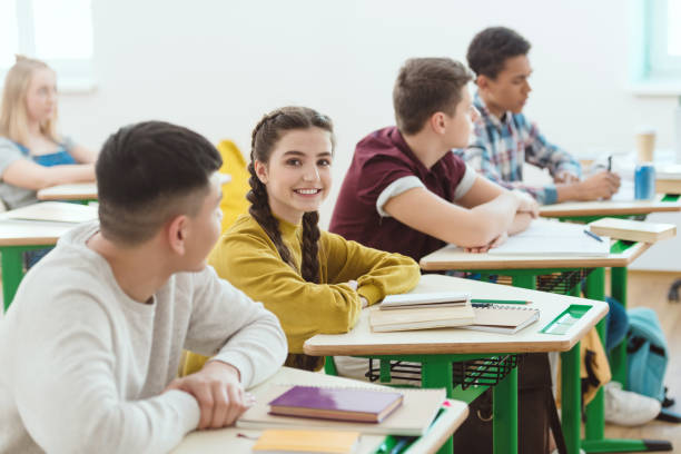 istock row of high school students sitting in class during lesson 1014260678