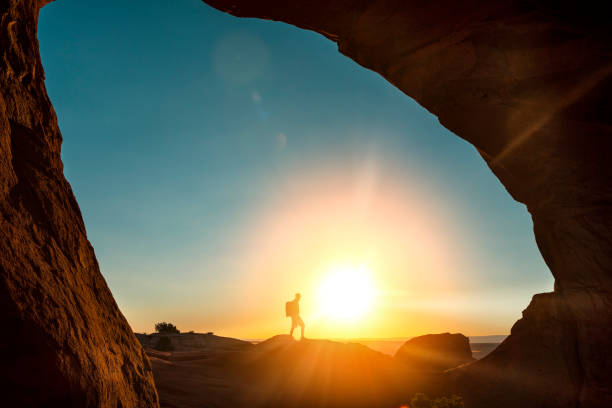 istock Hiker resting in Turret Arch 1014261320