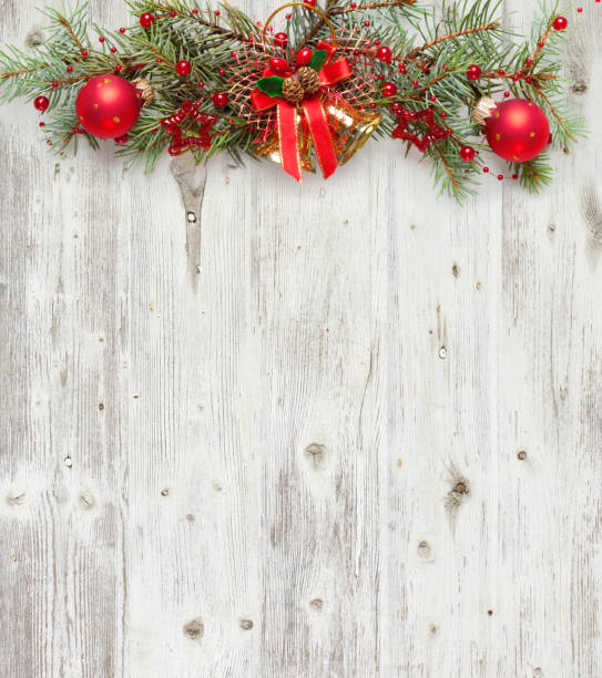 istock Christmas decoration on old grunge wooden board 1014274726