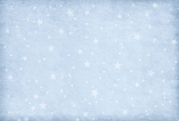 istock Vintage  light  blue paper decorated with  stars 1014274790