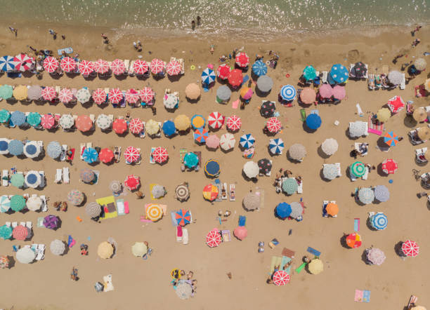 Aerial View of Umbrellas in a Beach of Aegean Sea Altınkum, Didyma, Aydin, Turkey beach umbrella aerial stock pictures, royalty-free photos & images