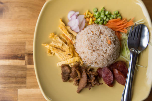 istock Rice Seasoned with Shrimp Paste Recipe on wooden tab 1014287638